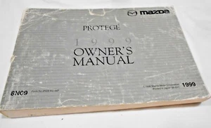 1999 MAZDA PROTEGE OWNER'S FACTORY MANUAL IN ENGLISH & FRENCH. FREE S/H - Picture 1 of 3