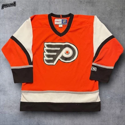 Camiseta Philadelphia Flyers Juvenil L/XL Cromo Naranja NHL Hockey CCM Retroceso Foto 1 de 4