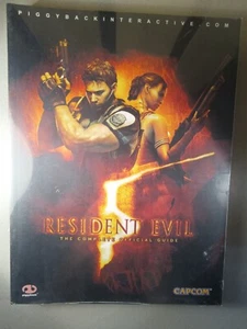 Resident Evil 5 : The Complete Official Guide by Piggyback Int. NEW and SEALED - Afbeelding 1 van 4