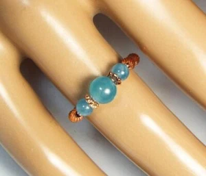 ANILLO ELÁSTICO CYNTHIA LYNN "SWEET DREAMS" AZUL VERDE AGUAMARINA TONO ORO ROSA - Imagen 1 de 1