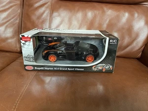 RC Bugatti Veyron Grand Sport Vitesse Licensed Model Car Black/Orange 1:14 NIB - Picture 1 of 6