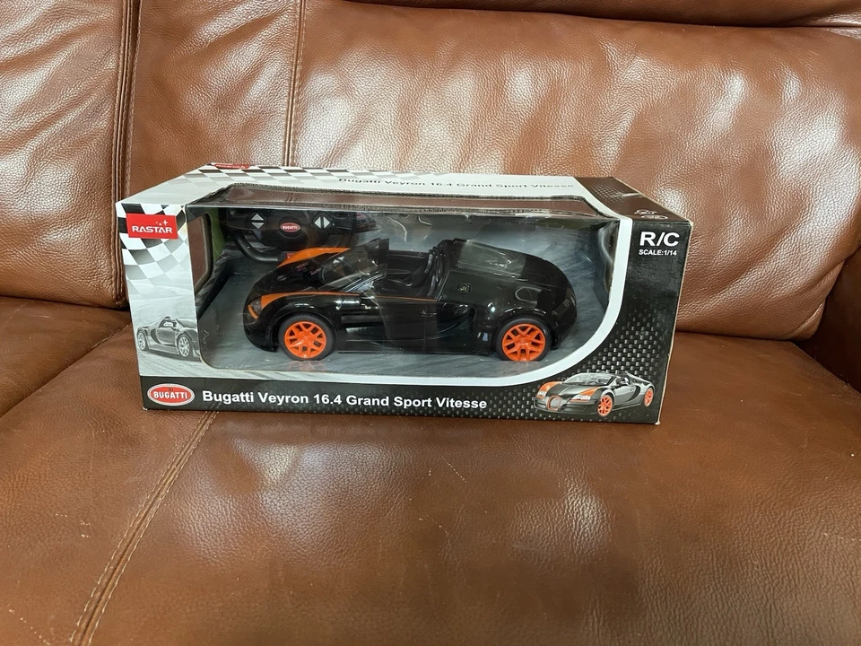 RC Bugatti Veyron Grand Sport Vitesse Licensed Model Car Black/Orange 1:14 NIB - Image 1 of 4