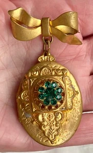 Antique locket brooch 2 parts, bow top, locket below has green rhinestones - Picture 1 of 5