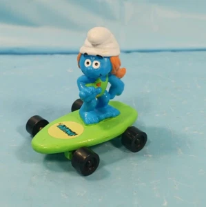 Vintage Peyo Smurf Skateboarding Smurfette Figure. - Picture 1 of 3