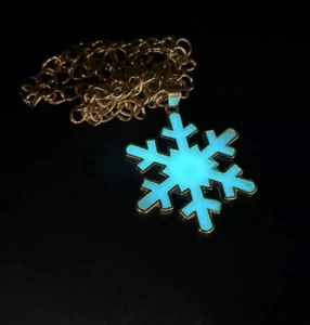 Glow In The Dark Schneeflocke Anhänger Halskette goldfarben - Bild 1 von 4