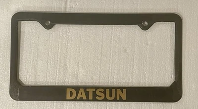 Marco de matrícula de plástico Datsun vintage Foto 1 de 4