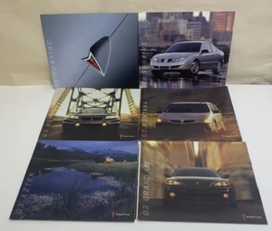 (6) 2003 Pontiac Sales Brochures Sunfire Aztek Grand Am Montana - Picture 1 of 14