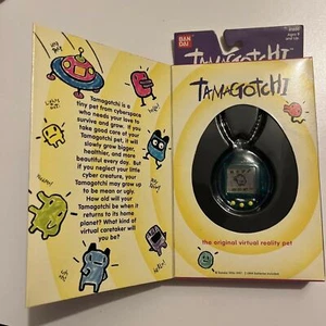*New Unopened* Tamagotchi Dark Green 1997 The Original Virtual Reality Pet #1800 - Picture 1 of 12