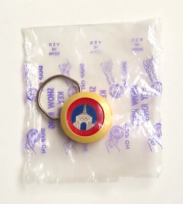 Llavero de plástico de colección de los Juegos Olímpicos de Los Ángeles Memorial Coliseum 1984, amarillo, nuevo de stock Foto 1 de 3