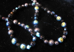Bellissima collana di perle tonde colore arcobaleno nero - Foto 1 di 5