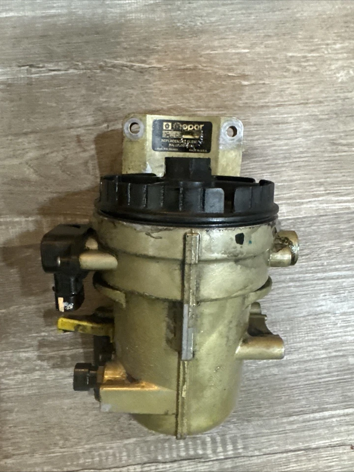 OEM 2003-2007 Dodge Ram 5.9L Cummins Fuel Filter Housing Canister 05015581AA - Image 1 of 4