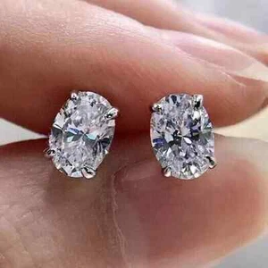 4Ct Oval Cut Lab-Created Diamond Solitaire Stud Earrings 14K White Gold Plated - Picture 1 of 7