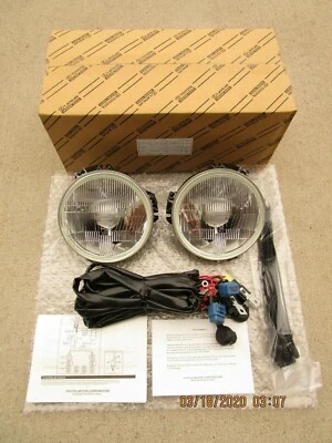 90 - 98 TOYOTA LAND CRUISER FJ70 FZJ70 HALOGEN HEADLIGHTS KIT W/ RING OEM NEW - Image 1 of 4