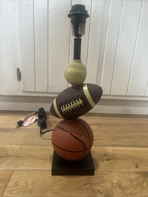 Ashley Furniture Nyx Poly Table Lamp Kids 24 Inch-No Shade - Image 1 of 4