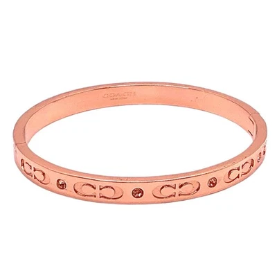 "Brazalete brazalete con bisagras Coach firma C oro rosa 7""" Foto 1 de 3