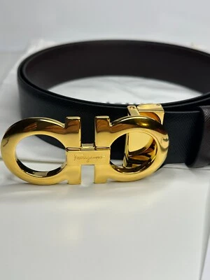 CINTURÓN REVERSO SALVATORE FERRAGAMO HEBILLA DORADA NEGRO Y MARRÓN Foto 1 de 4