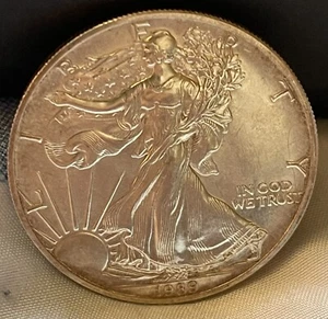 1989 American Eagle Silver Liberty Dollar, .999 1 troy oz. Natural Toning - Picture 1 of 2