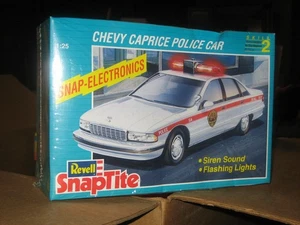 Revell SnapTite Chevy Caprice Polizeiauto 1/25 Snap Electronics Factory Sealed - Bild 1 von 5