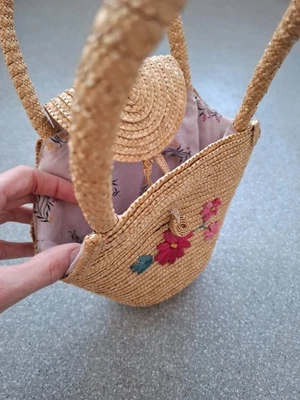 Vintage Handwoven Straw Handbag Basket with embroidered pink and teal flowers - Image 1 of 4