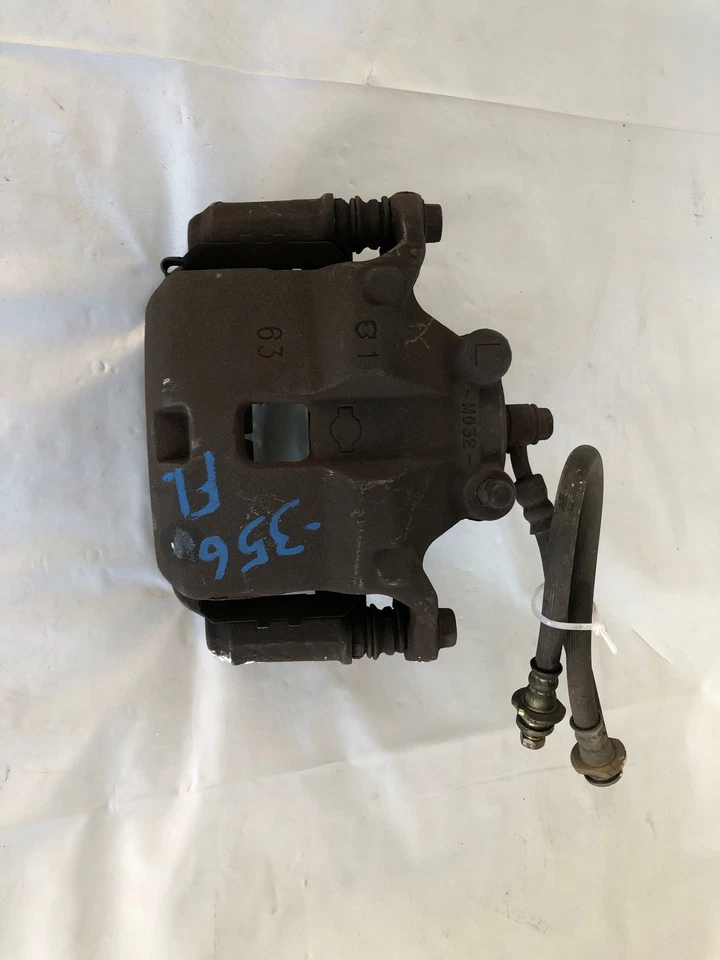 Pinza de disco de freno delantera izquierda Nissan Sentra 2000-2006 lado del conductor LH 1,8 L A/T G Foto 1 de 4