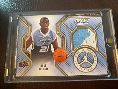 Parche con logotipo Jrue Holiday 2009 Upper Deck Draft marca Jordan #JC-JH RC JERSEY HEAD Foto 1 de 3