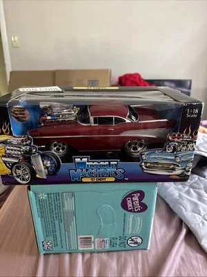Chevrolet Bel-Air 1957 Muscle Machines rojo borgoña 1:18  Foto 1 de 4