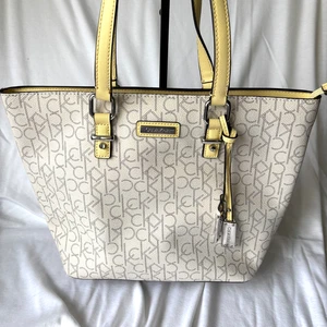 Calvin Klein Women's Key Item Signature Tote Bag Monogram Butter Yellow Straps - Picture 1 of 23