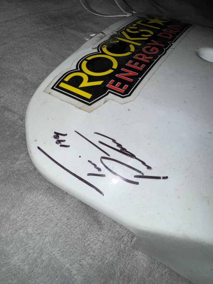 TRAVIS PASTRANA #199 - AUTÉNTICO FIRMADO HONDA MATRÍCULA DELANTERA - PRINCIPIOS DE 2000’S  Foto 1 de 3
