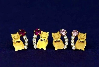 Pendiente de oro amarillo de 14k con circonita cúbica de gato Foto 1 de 4