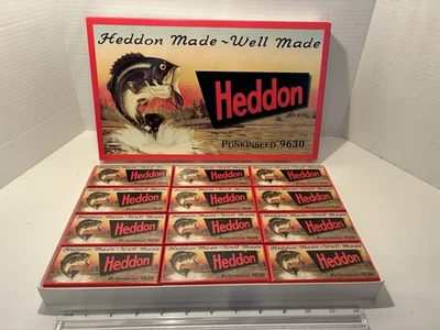 Juego de caja de distribuidor Heddon Punkinseed 9630. 12 señuelos y cajas vintage. Estado nuevo. Foto 1 de 4