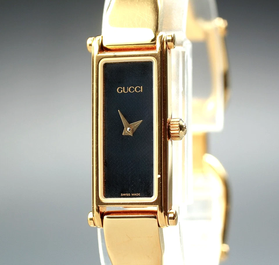 [Casi COMO NUEVO] Reloj para mujer vintage GUCCI 1500 13 mm dorado esfera negra rectangular Qz Foto 1 de 4