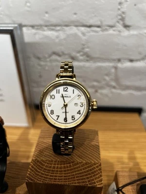 Reloj Shinola The Birdy Mujer – Pulsera Oro, Esfera Blanca (34mm) Foto 1 de 4