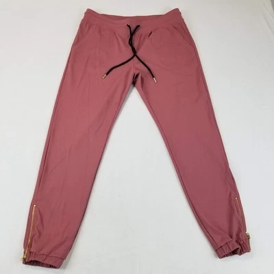 Pantalones deportivos ZYIA Active para mujer rosa medio cordón tobillo cremallera nailon Foto 1 de 4