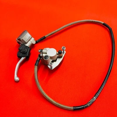 CRF150R FRONT BRAKE COMPLETE CALIPER GENUINE OEM HONDA CRF 150 R RB (2007-2024) - Image 1 of 4