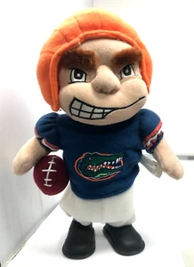 FLORIDA GATORS RUSHING FOOTBALL PLAYER PLUSH SINGS,WE WILL ROCK YOU MOVES - Picture 1 of 6