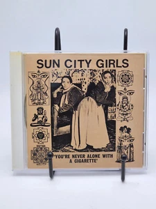Sun City Girls Singles Volume 1: You're Never Alone With A Cigarette - Imagen 1 de 3