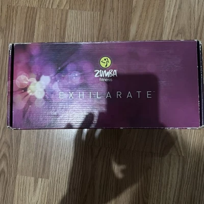 Zumba Fitness Exhilarate Body Shaping System Toning Sticks and Cd's  - Image 1 of 4