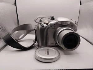 Appareil photo Canon Power Shot S1 IS argent 3,2 MP 10x optique PC1058 TESTÉ FONCTIONNEL - Photo 1/3