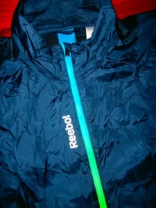 Para mujer Reebok PLAYDRY ROPA ACTIVA Chaqueta en aerosol ETIQUETA S GIMNASIO YOGA CICLISMO DEPORTE - Imagen 1 de 10