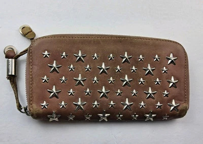 Cartera Jimmy Choo Star de cuero rosa con tachuelas con cremallera alrededor Foto 1 de 4