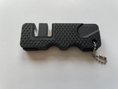 Afilador de cuchillos de bolsillo para exteriores mini llavero portátil de cerámica de acero al carbono Foto 1 de 3