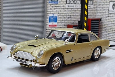 Modelo Aston Martin DB5 dorado escala 1:24 Foto 1 de 4