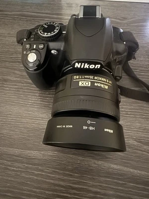 Cámara digital Nikon D3100 SLR negra (cuerpo, cargador, batería) Foto 1 de 4