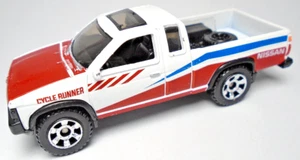 2019 MATCHBOX '95 NISSAN HARDBODY WHITE 3 1/8" DIECAST PICKUP TRUCK W RED & BLUE - Picture 1 of 6