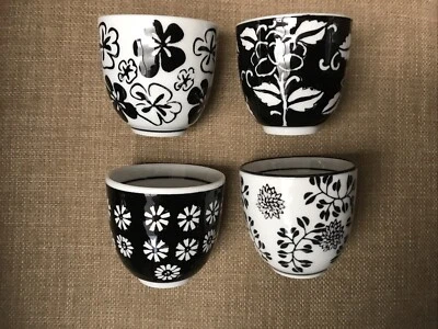 Pier 1 Imports Black & White Floral Akin Sake Teacups Set of 4 - Image 1 of 3