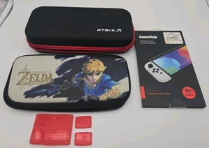  Nintendo Switch verschiedene 2 Reisehüllen + Original Spielehüllen + Displayschutz - Bild 1 von 7