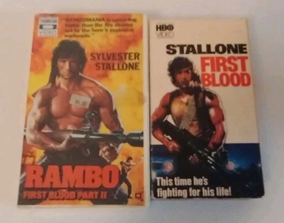 RAMBO First Blood Part I HBO Video & Part II Thorn EMI Clamshell VHS LOT OF 2 - Image 1 of 3