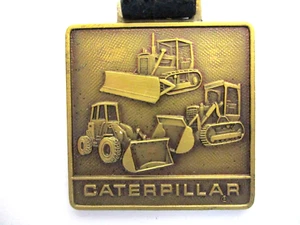 CLEVELAND BROTHERS CATERPILLAR FRONT END LOADER / DOZER METAL WATCH FOB / STRAP - Picture 1 of 5