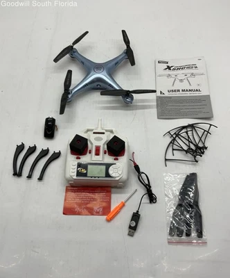 Drone cuadricóptero plegable azul Syma X5HC-1 con accesorios no probado Foto 1 de 4