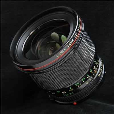 Canon Nuevo FD24mm F1.4L [Este objetivo gran angular L, muy apreciado para... - Imagen 1 de 4